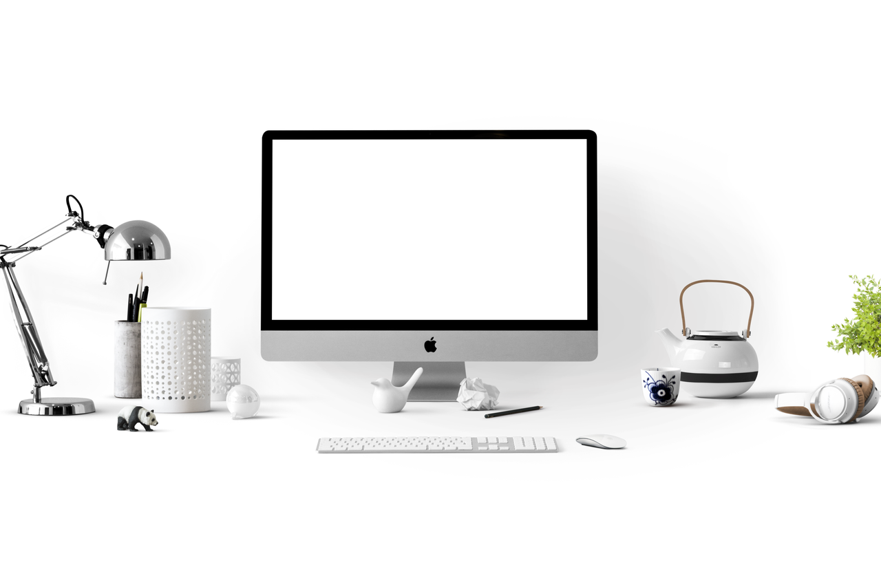 Services-02 Minimalist office desk with an iMac, lamp, and stationary, perfect for tech backgrounds.